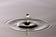 Water drop close up into a beautiful shape.