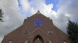 Clouds over Church with Crucifix and Stained Glass Timelapse