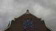 Dark Clouds Moving over a Church Time Lapse 1080p