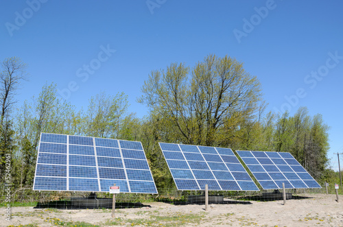 Photo: Solar Panels under blue sky Solar Panels under blue sky