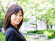 beautiful asian businesswoman in the park