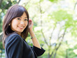 beautiful asian businesswoman in the park