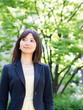 beautiful asian businesswoman in the park