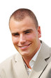 Young man smiling unformally wearing office suit