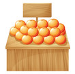 A stand with fruits and an empty signboard