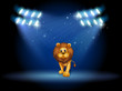 A lion at the center of the stage with spotlights