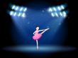 A girl dancing ballet at the stage with spotlights