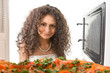 Girl open a microwave