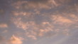 Clouds illuminated by the setting orange sun. Time-laps 50X
