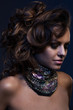 Beautiful woman with big necklace