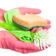 Hand in a pink glove holding sponge