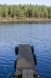 Old jetty at calm lake