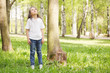 Girl at tree looking up