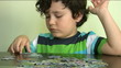 Child solving a puzzle