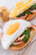 Bread au gratin with fried egg and spinach