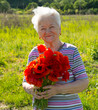 Old woman with poppies