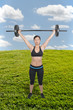 Photo: Asian Woman Working with Weights Asian Woman Working with Weights