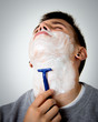 young man shaving