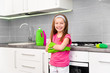 girl make cleaning in the kitchen