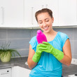 woman cleans the kitchen