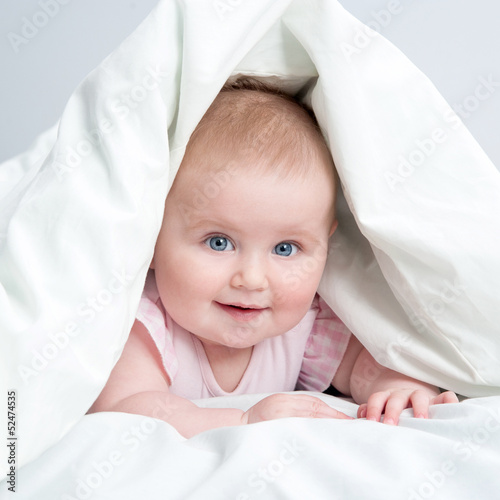 Photo: cute baby under a blanket cute baby under a blanket