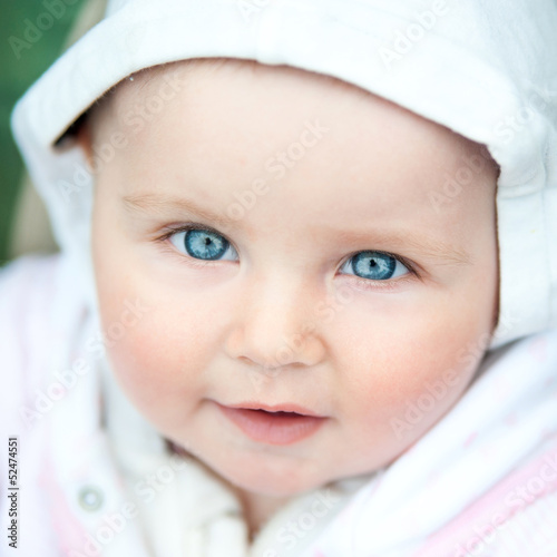 Photo: cute blue-eyed baby cute blue-eyed baby