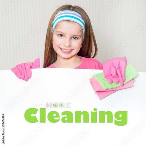 Photo: little girl cleans the house little girl cleans the house
