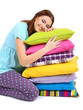 Photo: Beautiful young girl with pillows isolated on white. Beautiful young girl with pillows isolated on white.