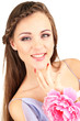 Young woman with beautiful hairstyle and flower, isolated