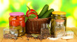 Tasty green cucumbers and red tomatoes in basket,