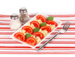 Foto: Cheese mozzarella with vegetables in the plate isolated on Cheese mozzarella with vegetables in the plate isolated on