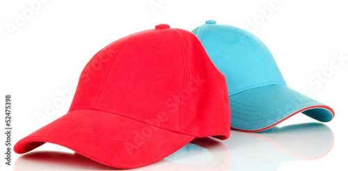Photo: Red and blue caps cap isolated on white Red and blue caps cap isolated on white