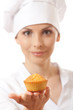 Photo: Woman cook holding cake, isolated on white background Woman cook holding cake, isolated on white background