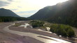 Aerial flight high over mountain river "Isar"