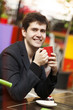Style man with cup and cake