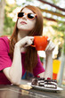 Photo: Style redhead girl with cup and cake Style redhead girl with cup and cake