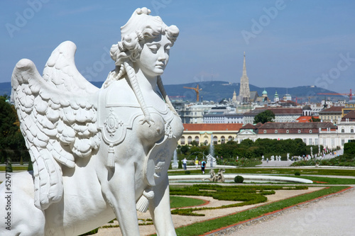 Photo: Sphinx statue and Belvedere garden in Vienna, Austria Sphinx statue and Belvedere garden in Vienna, Austria