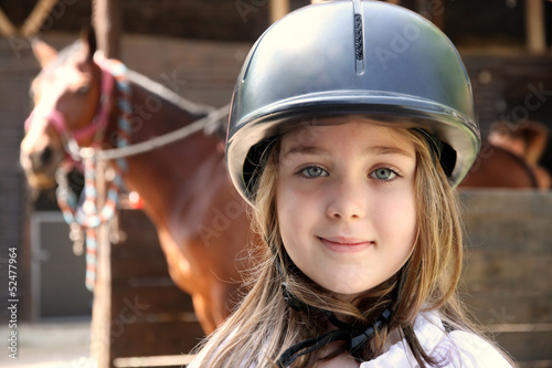 Photo: Little girl and brown Horse Little girl and brown Horse