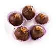 Delicious assorted dark chocolate truffle candies, top view
