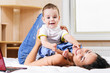 mother and son are playing