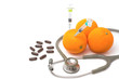 Pill,stethoscope,syringe with orange fruit ,Vitamin C supplement