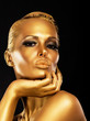 Fantasy. Styled Enigmatic Woman with Gold Make-up. Luxury