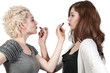 Photo: Woman Applying Makeup Woman Applying Makeup