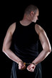 Arrested man handcuffed hands at the back