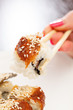sushi with chopsticks