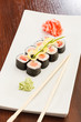 Photo: sushi with chopsticks sushi with chopsticks
