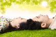 Photo: Happy couple with heads together under leaves Happy couple with heads together under leaves