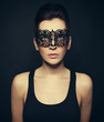 beautiful girl in mask on the carnival