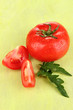 Fresh tomato on colour wooden background