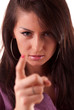 Beautiful brunette threatening finger